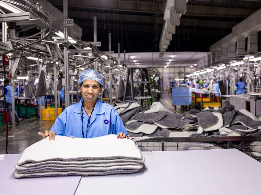 Factory worker at a production line